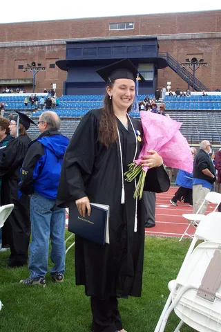 Sarah poses for the camera after the commencement. 