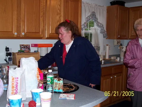Eric's family's hospitality was legendary, providing everyone in attendance with excellent hamburgers, cake, and coffee, while they watched a Red Sox rain delay. 