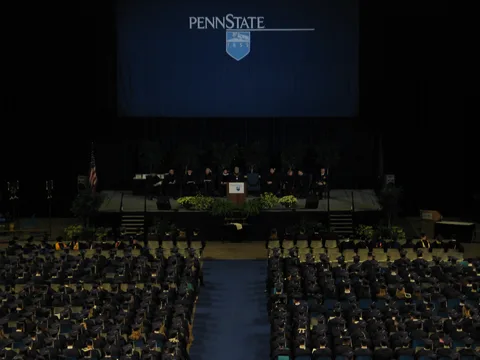 After everyone was seated, Dr. Spanier was the first to say a few words. 