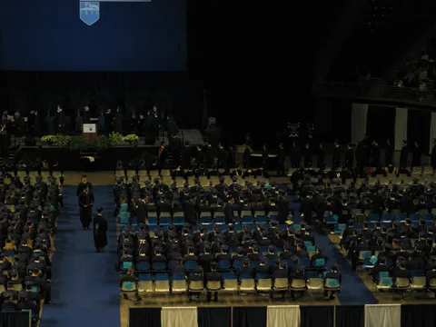 As people walked up to the stage, a "Nomenclator" who practiced specially for the occassion read most of the names perfectly. 