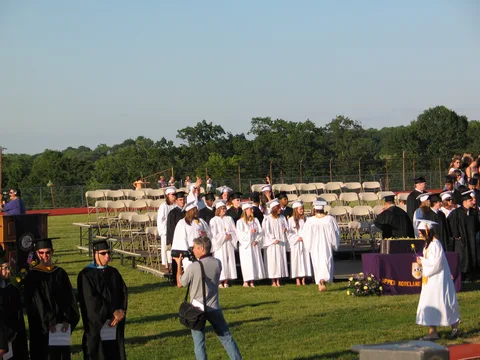 The procession ended in the graduates lining up in chairs facing the crowd.