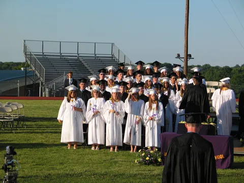 graduates caps gowns tassels