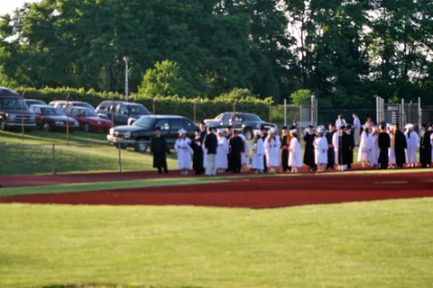 The graduates began the procession promptly at 7:00pm.