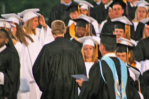 Chris was relieved to be finished after the degree was handed to him.