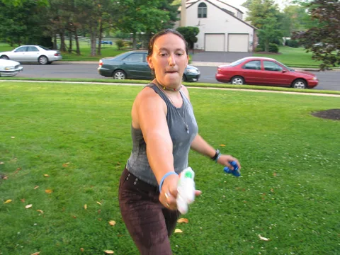 Sarah Duncan started a water fight around 7:00pm. Here, she shoots photographer Steve Sokolowski.