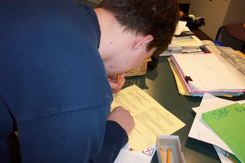 Matt Cinquino, a sophomore, fills out a ballot.