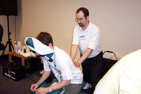 Massage therapists were present at the health fair to demonstrate their services.