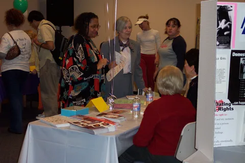 Yvonne Thompson and Dean and CEO Dr. Karen Wiley Sandler stop to chat with hospital staff.
