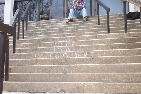 Lisa Fetcher utilized an innovative way of campaigning: by writing her name on the side of steps.