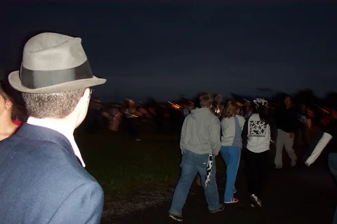 More shots of dancers walking towards Porter Road. 