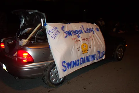 The "Swinging Lions" banner proudly advertises the club's interest. 