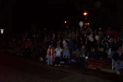 In front of Atherton Hall, people stood six or seven deep. 