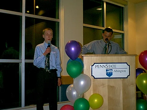 Public Relations Officer Chris Brown inaugurates Public Relations Officer-Elect Steve Sokolowski.