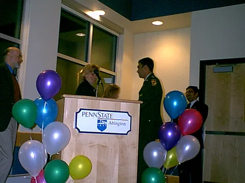 Jayneel Patel, dressed in a full ROTC uniform, is recognized.