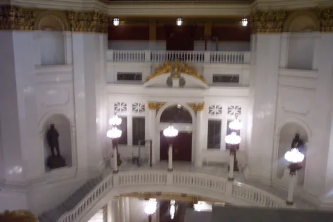 The tour proceeded up the stairs that surround the central open space of the building.
