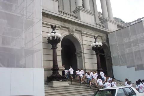Some repairs were being made to the exterior facades of the building while the students entered through the front doors.