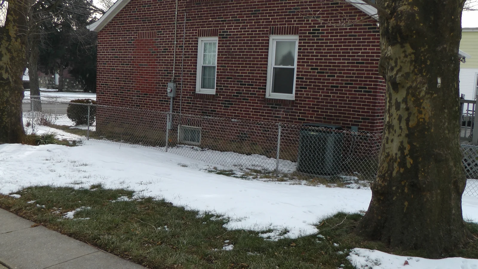 A view looking from the house across the yard toward 9220 Torresdale Avenue.