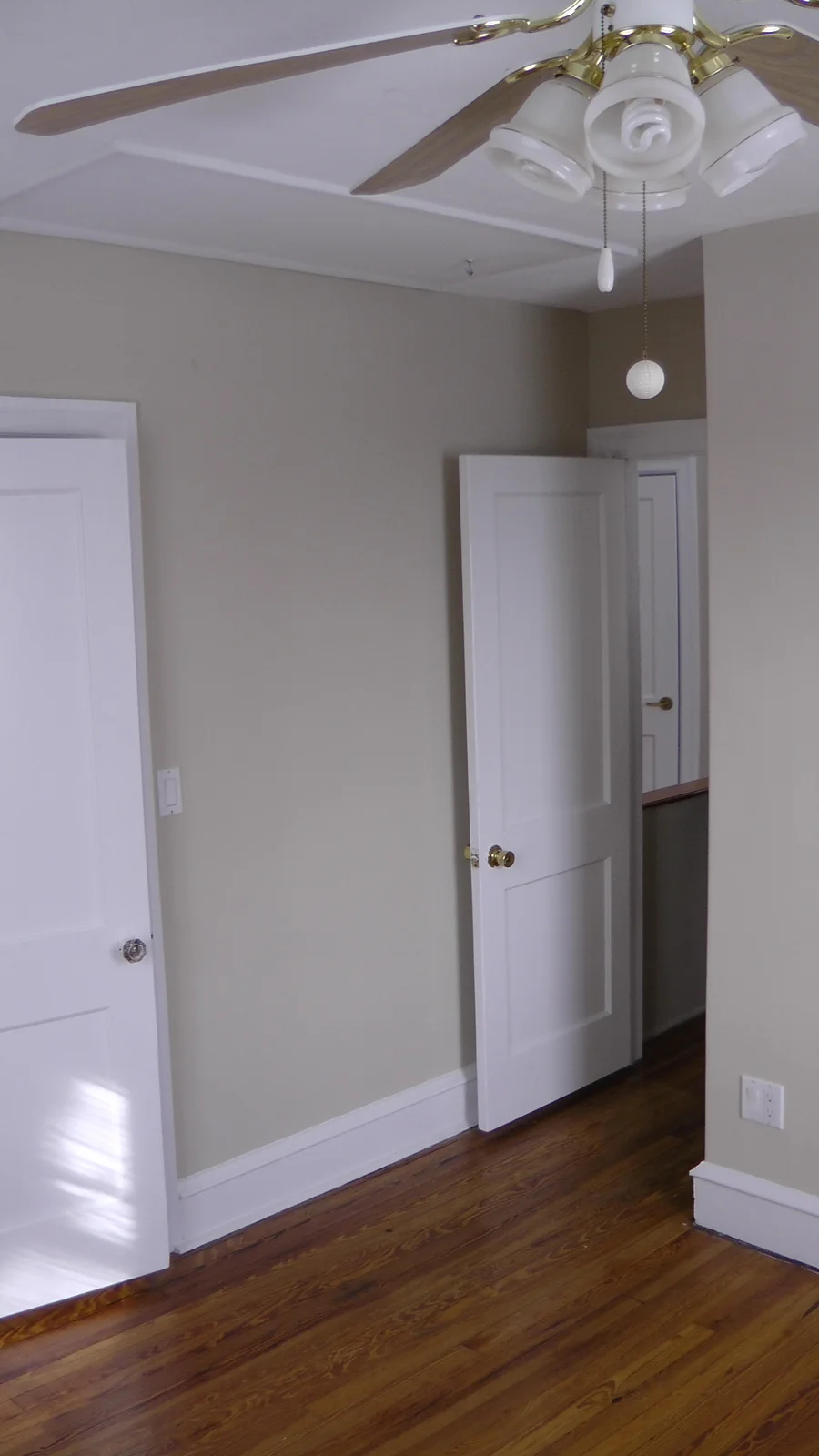 Looking out from the second bedroom towards the hallway.