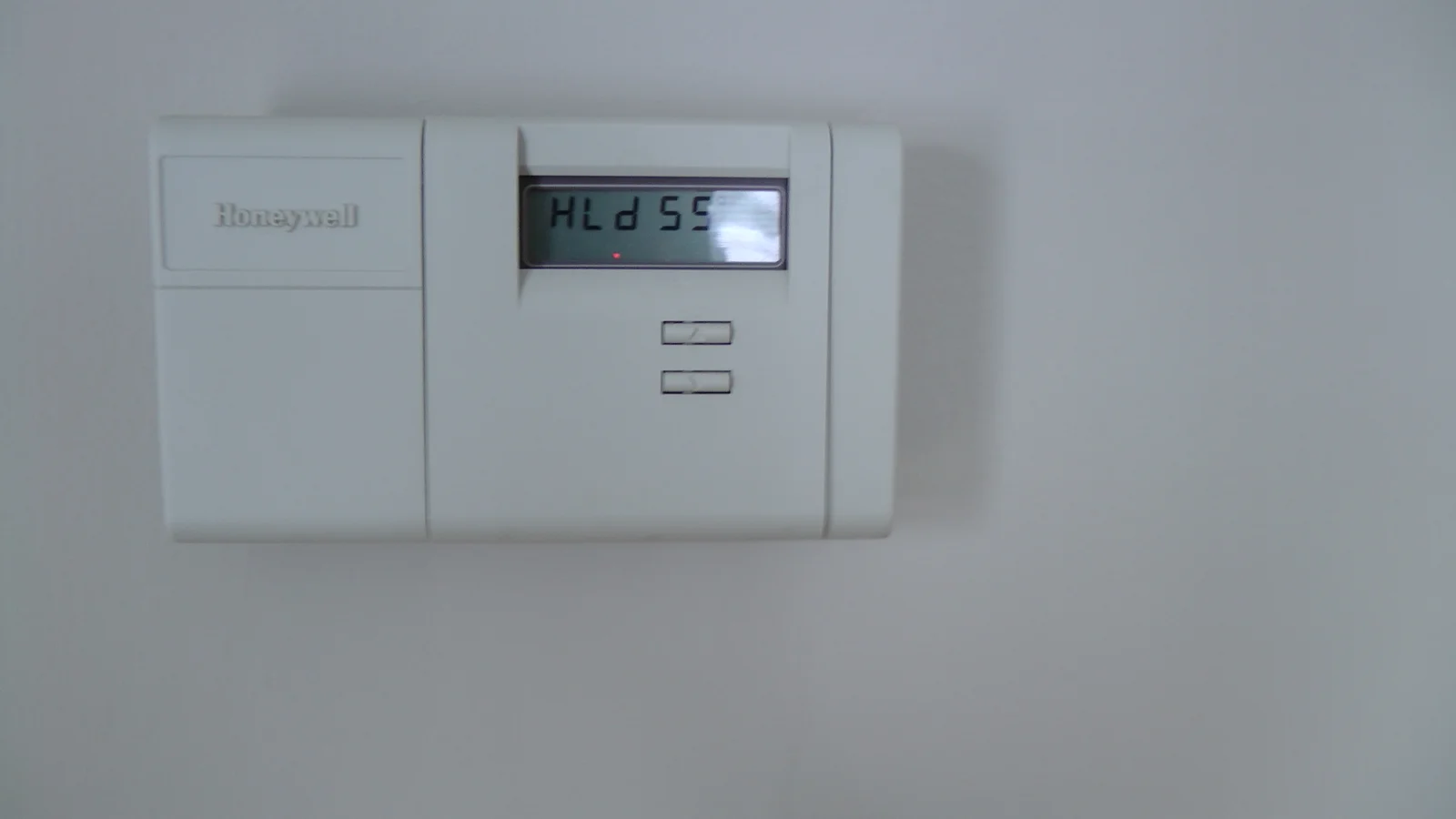 This thermostat, located in the dining room, controls the central heating.