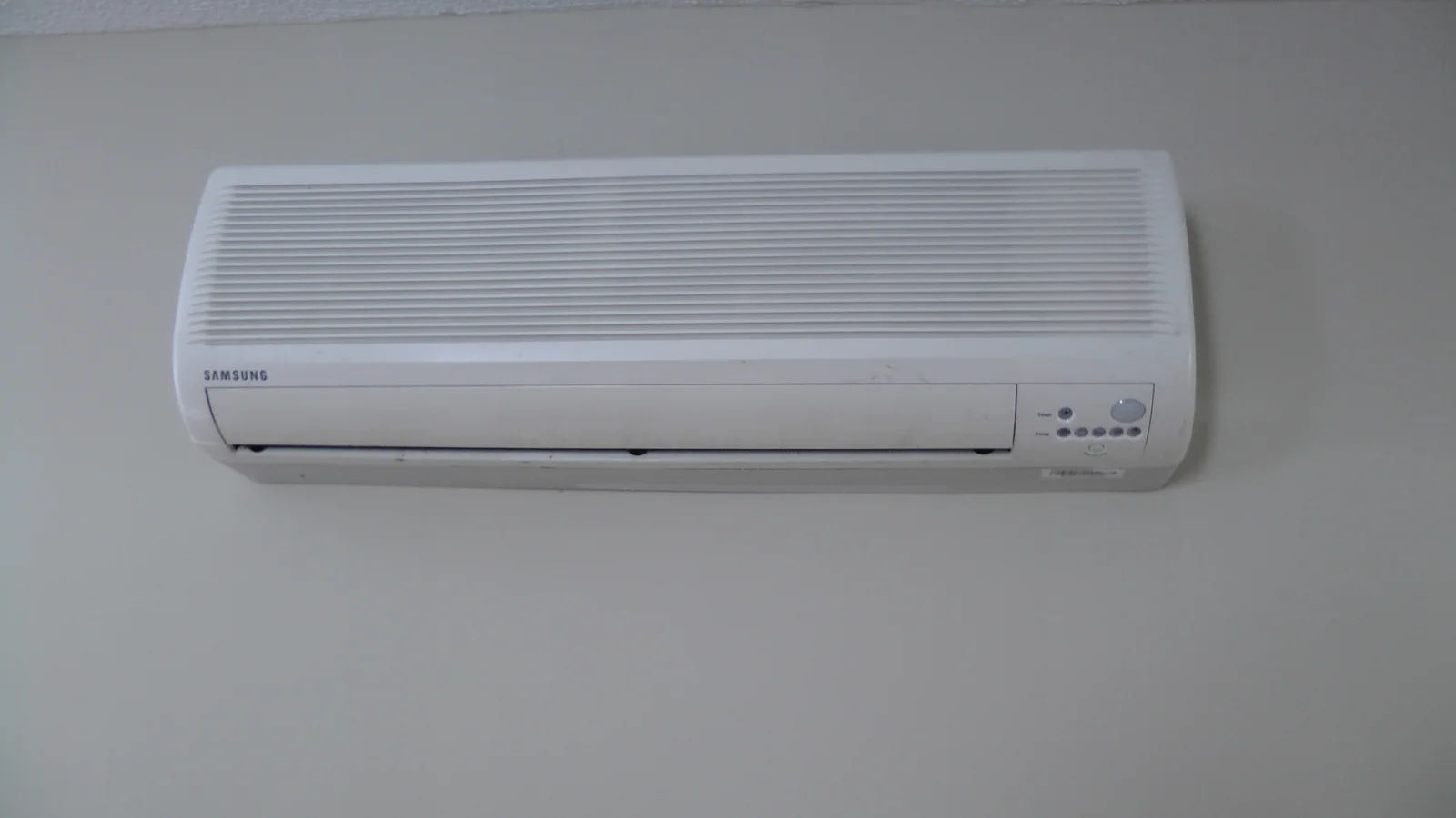 This air conditioning unit is mounted at the entrance to the living room.
