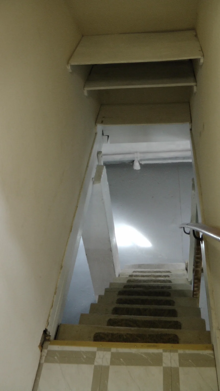 The top of the stairwell leading to the basement.