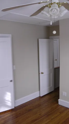 Looking out from the second bedroom towards the hallway.