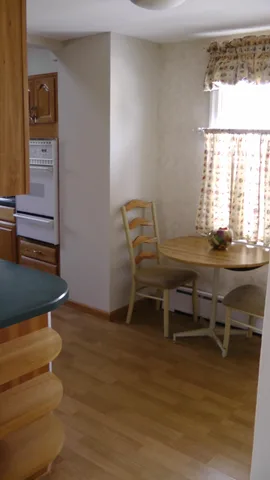 A view of the kitchen entryway from the dining room.