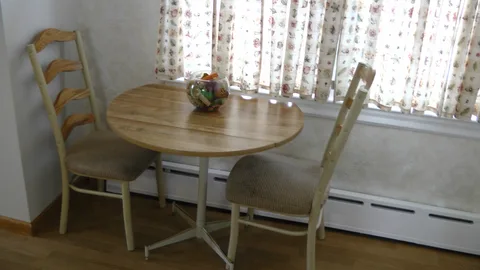 The previous owner used this space as an eating area inside the kitchen.  It can also be used for storage or other appliances.  The table and chairs ARE INCLUDED in the price of the house.