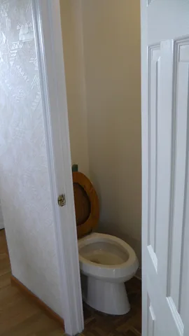 A powder room is available immediately adjacent to the kitchen.